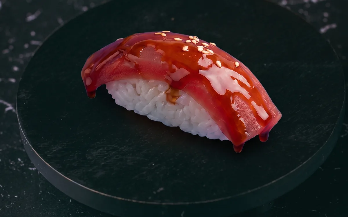 Nigiri de atún teriyaki: atún marcado sobre arroz con salsa teriyaki